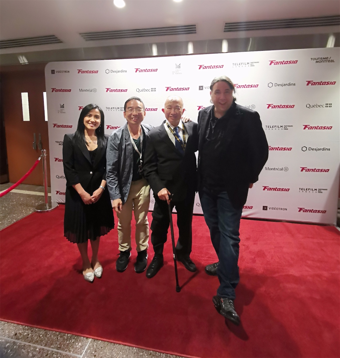 The Hong Kong Economic and Trade Office (Toronto) (HKETO) supported the screening of seven Hong Kong films at the 26th Fantasia International Film Festival held from July 14 to August 3 in Montreal. Photo shows (from left) the Director of the HKETO, Ms Emily Mo, the Co-director of Asian Programming, Fantasia International Film Festival, Mr King-wei Chu, Hong Kong Director, Mr John Woo, and the Artistic Director of Fantasia International Film Festival, Mr Mitch Davis at Concordia Hall Theatre on July 15. 