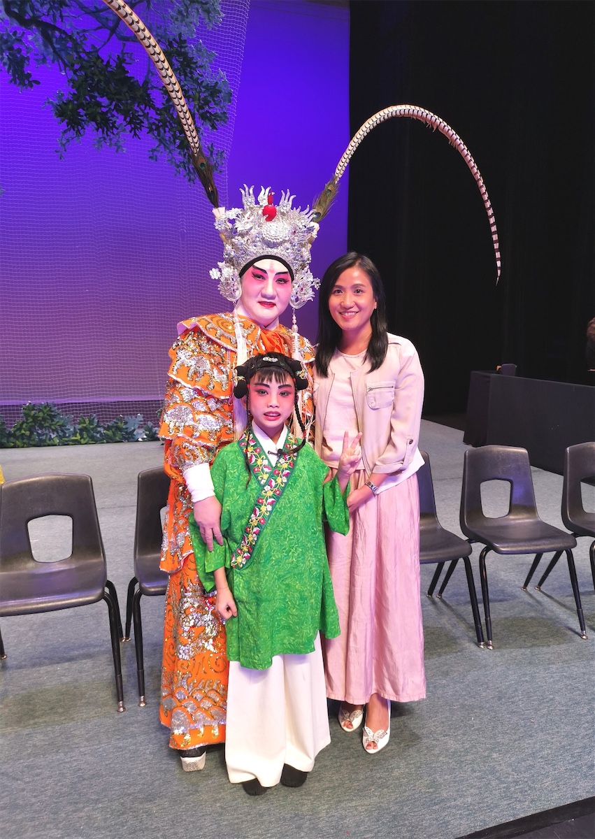 The Director of the Hong Kong Economic and Trade Office (Toronto), Ms Emily Mo (right), is pictured with the Director of Starlight Chinese Opera Performing Arts Centre, Ms Alice Chan (left), and a Cantonese opera starlet (centre) after the Cantonese opera performance at Flato Markham Theatre in Markham on July 24. 