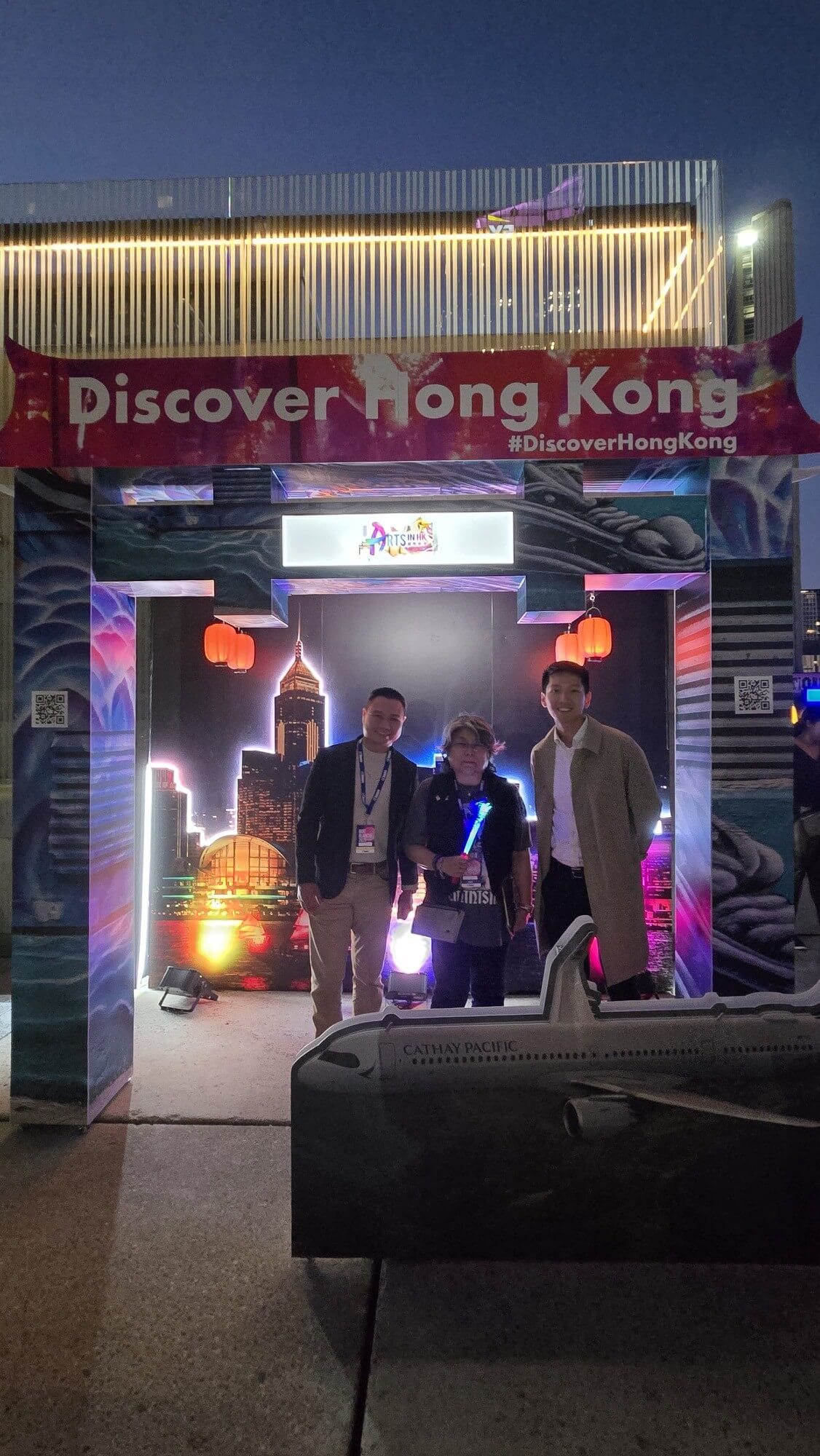 Hong Kong media artist, Ellen Pau (centre), is pictured with the Acting Director of Hong Kong Economic and Trade Office (Toronto), Mr Gavin Yeung (right), and the Senior Marketing Manager of Hong Kong Tourism Board, Mr Jorge Lee, at Nuit Blanche Toronto 2025 on October 4.